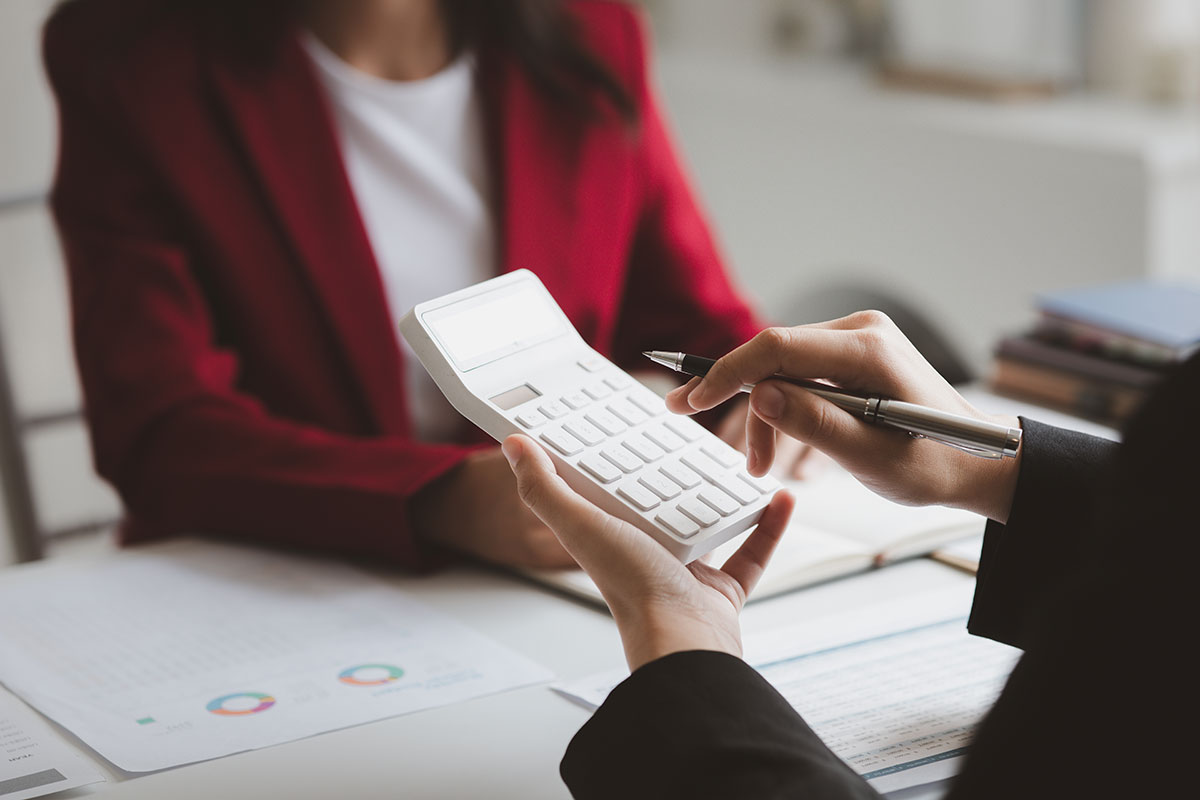 Tax attorney sharing taxing with a client